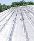 Heavy Hitter Roof Repair Tape Waterproof Heat Insulation Aluminum Foil applied on a sloped roof for leak prevention.