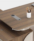 Close-up of the Ultimate Sit Stand Desk Boss Level Workstation with wireless charger and smooth wood finish.