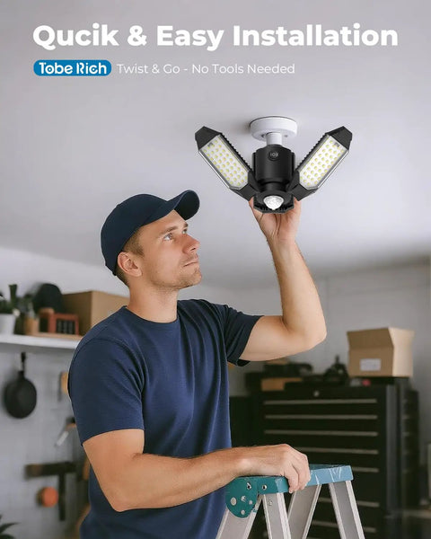 Installation of Beast Mode 8000LM Motion Sensor Garage Light With 360 Degree Detection And 3 Switch Modes 6500K Cool White LED