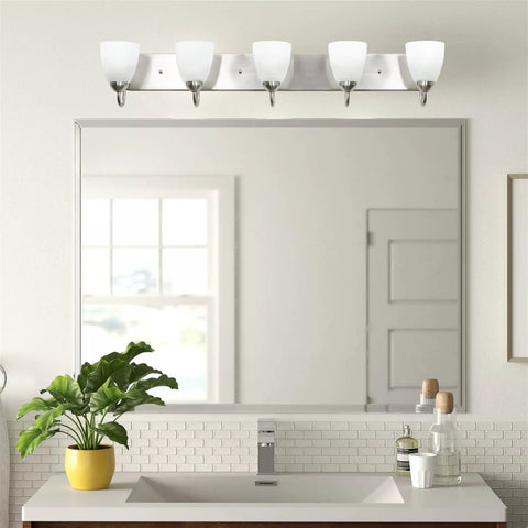 Armada 36 Inch Five Light Modern Vanity Light With Brushed Nickel Finish And Frosted Glass Shades Mounted Above Bathroom Mirror