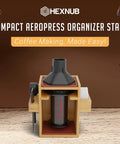 Compact Bamboo AeroPress Organizer Stand For Your Coffee Setup Keep All Accessories In One Caddy Including Filter Holder Mug Storage Rack Funnel Scoop And Silicone Drip Mats In Rich Brown on counter with coffee beans
