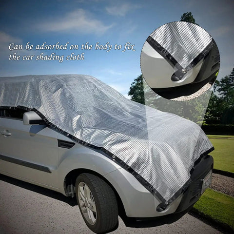 Silver car cover on grey vehicle with close-up of suction cup attachment for securing the car shading cloth in outdoor setting.
