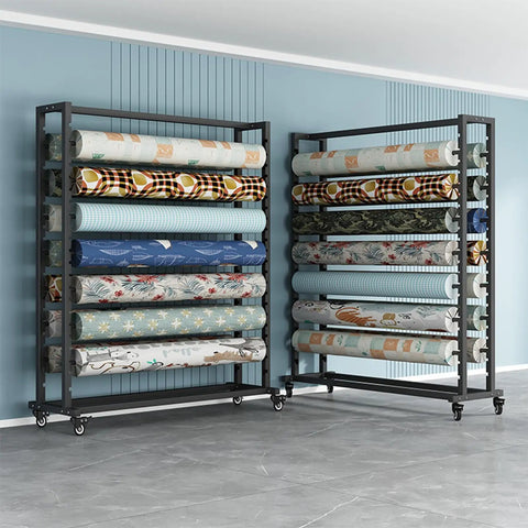 Heavy Duty Mobile Fabric Roll Storage Rack On Casters, Adjustable 18 Rod Organizer For Vinyl Leather And Window Film, Built Tough To Store Every Big Roll Secure with multiple rolls of patterned fabric.