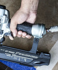 Lightweight 18 Gauge Brad Nailer With Hella Cushion Grip, 2-inch capacity, shown being held, ideal for precision trim work.