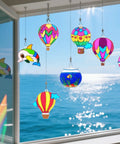 Colorful hot air balloon sun catchers from 30 Set Hot Air Balloon Sun Catcher Craft Kit For DIY Window Art Easy Setup.