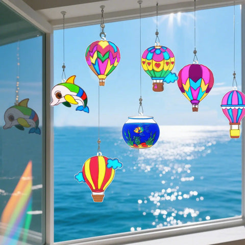 Colorful hot air balloon sun catchers from 30 Set Hot Air Balloon Sun Catcher Craft Kit For DIY Window Art Easy Setup.