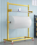 Heavy Duty Bubble Wrap Roll Dispenser With Razor Blade Cutter And Locking Swivel Casters, yellow steel frame with large rolls.