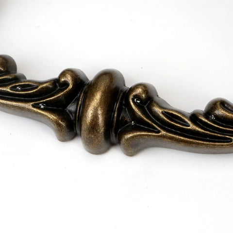 Close-up of Four Piece 150mm Center Drawer Pull Handles in Zinc Alloy, Rustic Vintage Style, Antique Yellow Bronze Finish