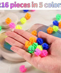 216 Piece Multicolor Bike Wheel Spokes Beads Clip On Decorations For Spokes And Rims held in hand showing colors