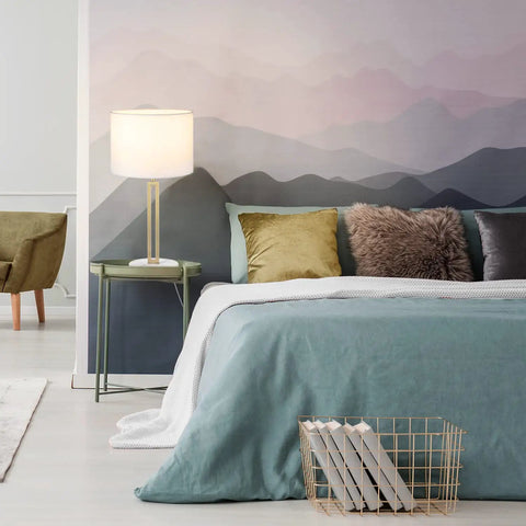 Paloma Table Lamp By Novogratz X Globe on bedside table, brass base, white shade, modern glam style in bedroom setting.