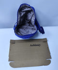 Open Lightweight Daypack For Hiking And Camping In Bold Blue 11 By 9 By 10 Inches showing interior and packaging