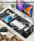 XL Gaming Mouse Pad With Stitched Edges, Black And White Desk Mat 31.5 by 15.8 Inches on a desk with keyboard and mouse