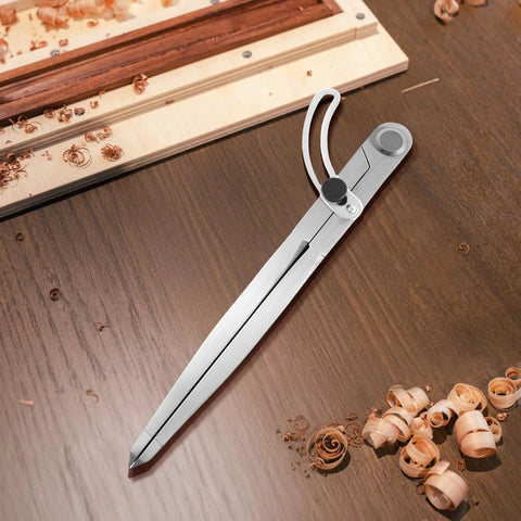 Heavy Duty Six Inch Alloy Metal Compass Scribe Dead Nuts Accurate Layout Divider on wooden surface with shavings.