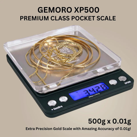 Platinum XP500 Pro Grade Jeweler Pocket Scale with gold chains on platform, 500g capacity, 0.01g precision, LCD display, silver finish.