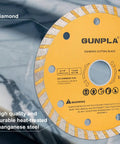 Close-up of a diamond cutting blade for tiles and masonry with markings for specifications and safety instructions.