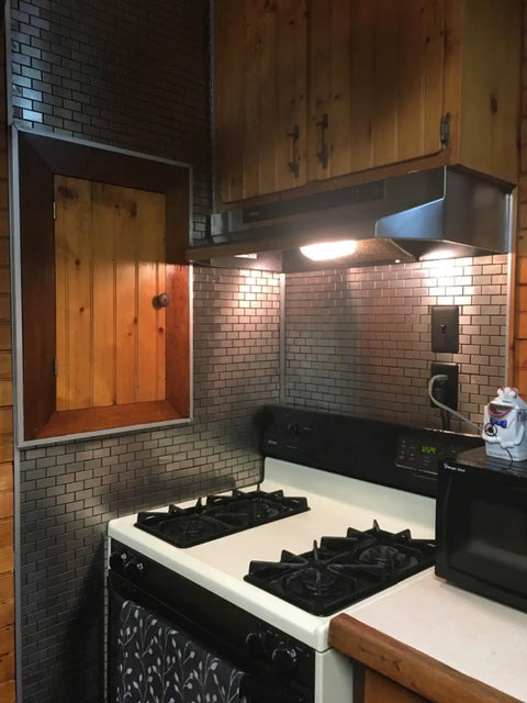 Stainless Steel Peel And Stick Backsplash Tiles Set Of 10 Sheets With 3D Metal Subway Silver Brick Mosaic in a kitchen setting