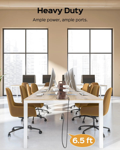 Power Strip Tower With 12 AC Outlets And 6 USB Ports, 6.5ft Extension Cord on office desk with computers and chairs