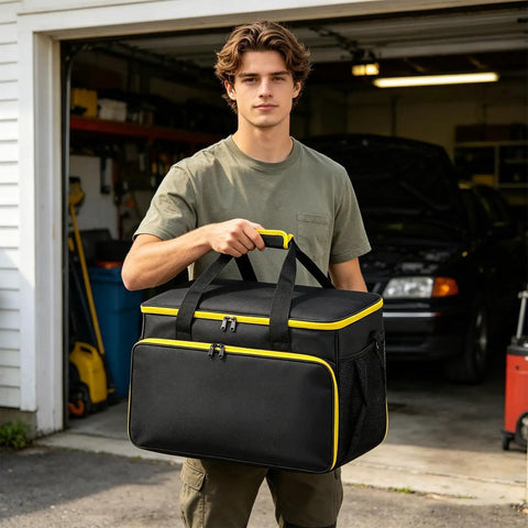 Slick Steam Cleaner Carry Case Featuring Dang Generous Internal Pockets And Hassle Free Straps For Keeping Your Floor Steamer Nozzles And Hoses Super Tidy Anywhere, black with yellow accents, portable, held by a man.