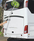 Using 62 Inch Microfiber Car Wash Brush Mop Kit with long handle and chenille head cleaning rear of a white bus.