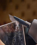 Hardcore Eight Piece Saw Blade Set Fits Neosander Sander To Create A Mini Reciprocating Saw Setup with detail cutting action on plastic.