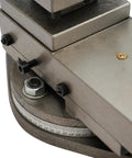Close-up of Universal AT300 Lathe Tool Post Assembly With 360 Degree Rotatable Tool Table, showing rotation scale and fasteners.