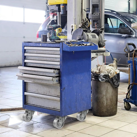 Blue tool cabinet on heavy duty steel casters in garage.