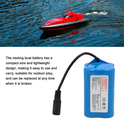Massive 12000mAh 7.4 Volt Rechargeable Lithium Battery For RC Fishing Bait Boats next to a red RC boat on water
