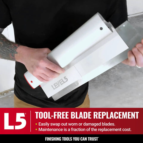 Person holding 24-Inch Skimming Blade With 0.3mm German Stainless Steel Insert Replaceable Blade for drywall finishing.