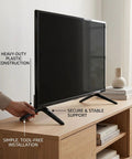 Replacement TV Stand Legs For 40 To 43 Inch Televisions, Durable Plastic Feet With Screws, Black Minimalist Design on cabinet