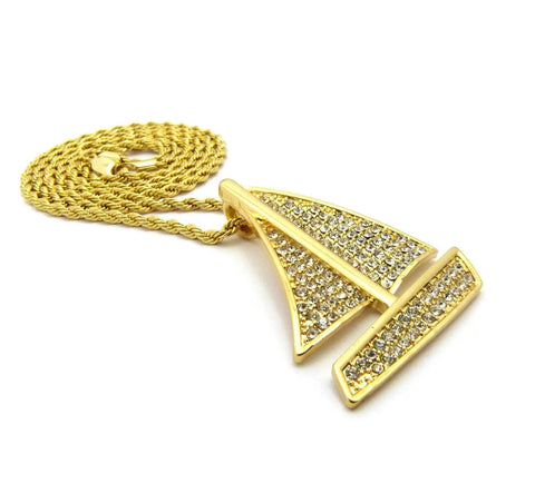 Gold tone sailing yacht pendant necklace on rope chain, iced out sailing yacht pendant necklace in gold tone, fashion style.