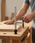 Quick Release Insertion Clamp For Workbench And T Bar Holes Heavy Duty Ratchet Table Clamp In Hardened Steel 160 By 80 Base With 16mm Insert Keeps Woodworking And Metalworking Parts Solid And Secure. Clamp on workbench holding wood panel