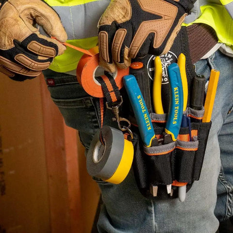 Tradesman Pro Maintenance Tool Pouch With Nine Pockets And Tape Thong 2 Inch Tunnel Belt Loop Electrician Holster worn on waist.