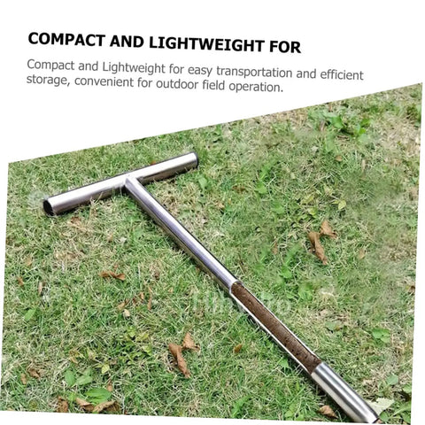 Stainless Steel T Handle Soil Sampler Probe For Lawn And Garden Care Pro Grade DIY Friendly Soil Sampling Tool placed on grass
