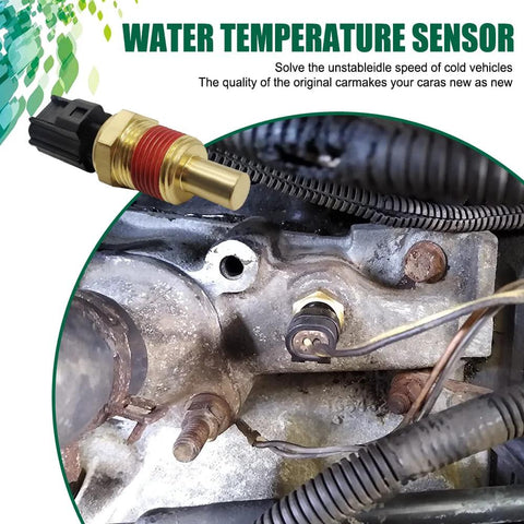 Water temperature sensor installed on engine block; brass body with red gasket and black electrical connector.