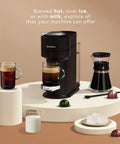 Vertuo Next Deluxe Coffee And Espresso Maker With Aeroccino Milk Frother, One Touch Single Serve Brewer displayed with accessories