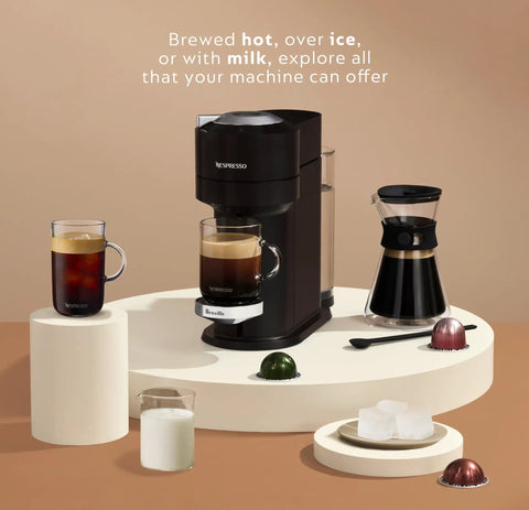 Vertuo Next Deluxe Coffee And Espresso Maker With Aeroccino Milk Frother, One Touch Single Serve Brewer displayed with accessories
