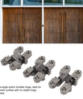 Invisible Concealed Hinges 3 Pack 43mm 180 Degree Zinc Alloy Cross Hinge for Cabinets and Jewelry Boxes No Visible Hinge Smooth Surface Black Nickel Finish Durable Mini Door Hardware displayed on table with wooden doors in background.