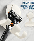 Hassle Free Heavy Duty Suction Cup Razor Holders For Bathroom Sink Organizer With Super Strong No Drill Grip Towel And Loofah Hooks Clutter Free Kitchen And Shower Storage Rack 2 Pack showing razor in white suction holder.