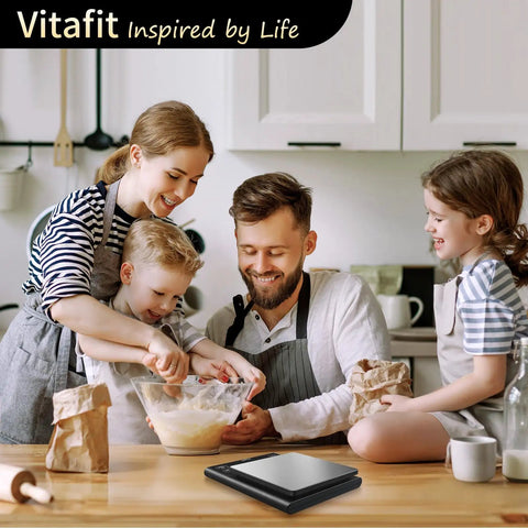 Family baking in kitchen with 11 lb Digital Food Scale with Pro Grade Precision 0.0001 lb stainless steel kitchen scale displayed.