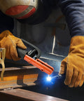 Using 300 Amp Brass T Style Welding Ground Clamp And Electrode Holder Combo for heavy duty welding in a workshop.