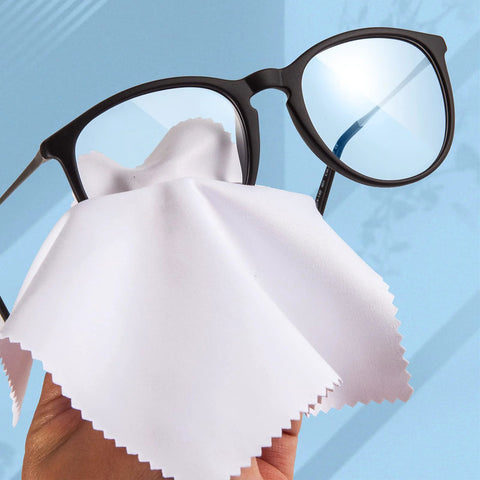 Eyeglass cleaning cloth, white microfiber, 5x6 inch; front view with black-framed glasses
