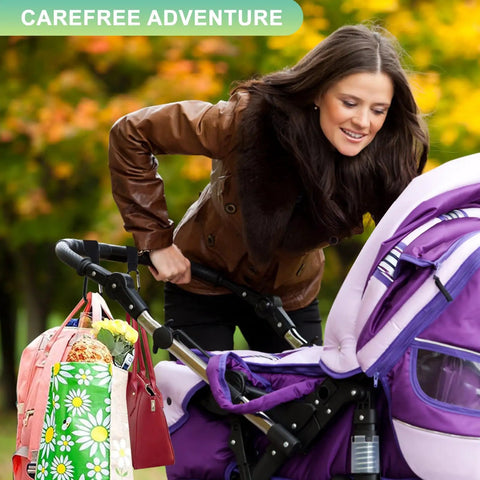 Woman using Go To Hands Free Stroller Hooks For Bags, 2 Pack Non Slip Clips And Carabiner on purple stroller with shopping bags.