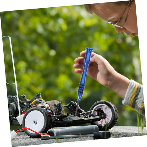 Child using RC Car Repair Tool Kit With Wrench, Screw And Fastener Set, Nut And Bolt Assortment, Durable Iron Tools on RC vehicle