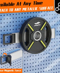 Double Sided Heavy Duty Magnetic Tool Holder 12 Inch Rust Resistant Magnetic Bar With Quick Release Handle attached to pegboard