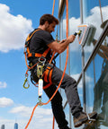 Worker using Heavy Duty Fall Protection Rope 50Ft Vertical Lifeline System With Rope Grab Snap Hooks And Shock Absorber on building