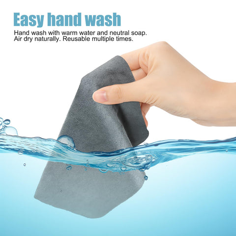 Hand washing a gray cloth from 10 Pack Microfiber Cleaning Cloths For Electronics, Camera Lenses, Eyeglasses, Phones And Laptops