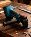 Cordless Battery Angle Grinder With Variable Speed And Low Vibration Ergonomic Handle crafted for paint scraping on a wood table.