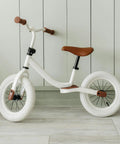 White balance bicycle with brown seat, suitable for 12.5 Inch Bike Inner Tube Fits Twelve And A Half By One Point Seven Five To Two Point Two Five Inch Schrader Valve AV32mm Replacement Tube For City Kids Commuter Road Mountain And Hybrid Bikes.