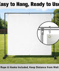 Heavy Duty Archery Backstop Net 5 By 10 Feet With Rope And Hooks shown on metal frame in backyard