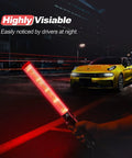 4 Pack 16 Inch LED Traffic Batons with white tip light, high visibility safety wands in use at night in urban setting